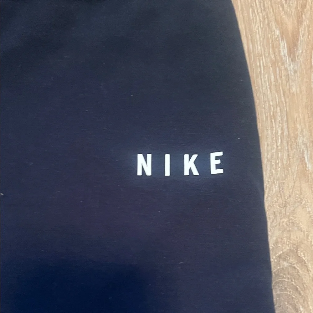 Nike Women’s front Zipper on high waist Black Joggers with White Mesh Large